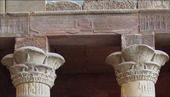Carvings of the sun and wings of the sky god Horus