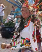 Native American dancer with a ceremonial rattle