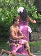 Polynesian dancers on a canoe Polynesian dancers on a canoe